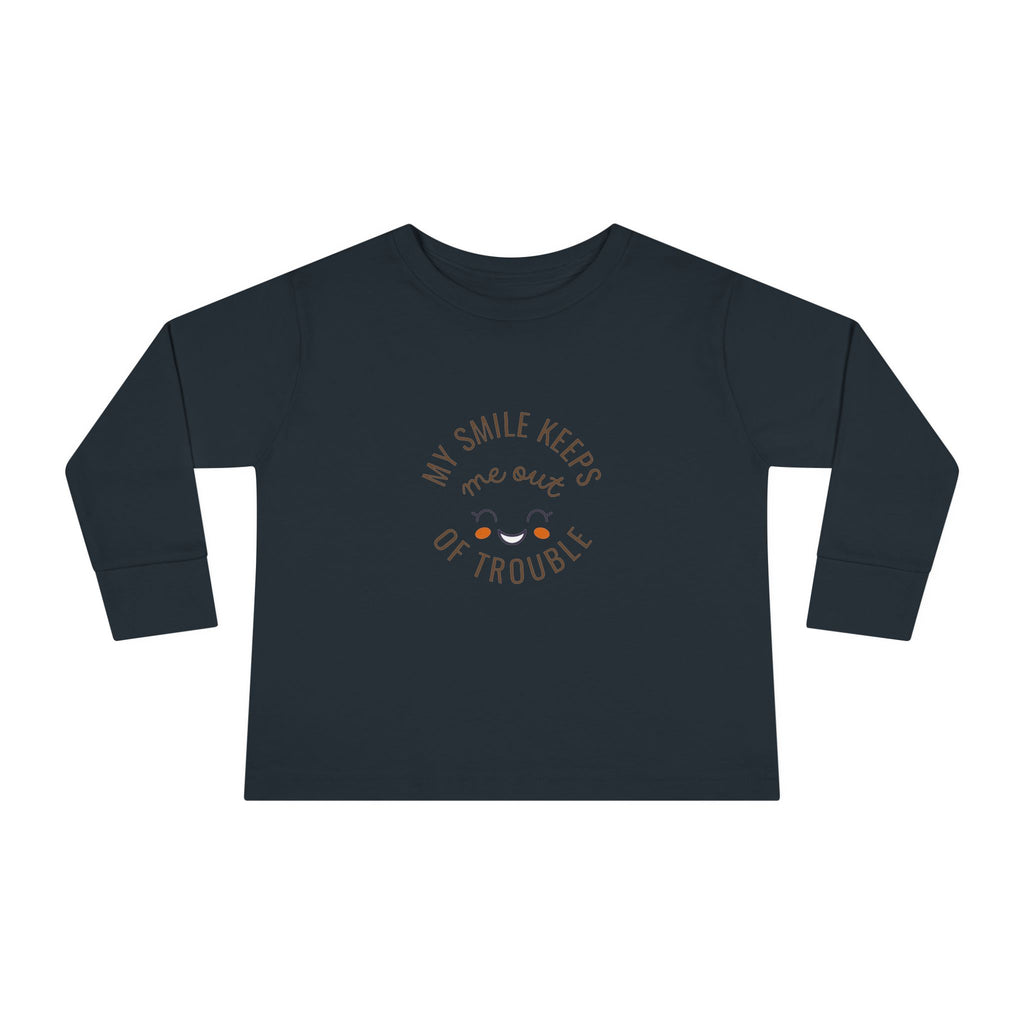 My smile keeps me out of trouble Toddler Long Sleeve Tee