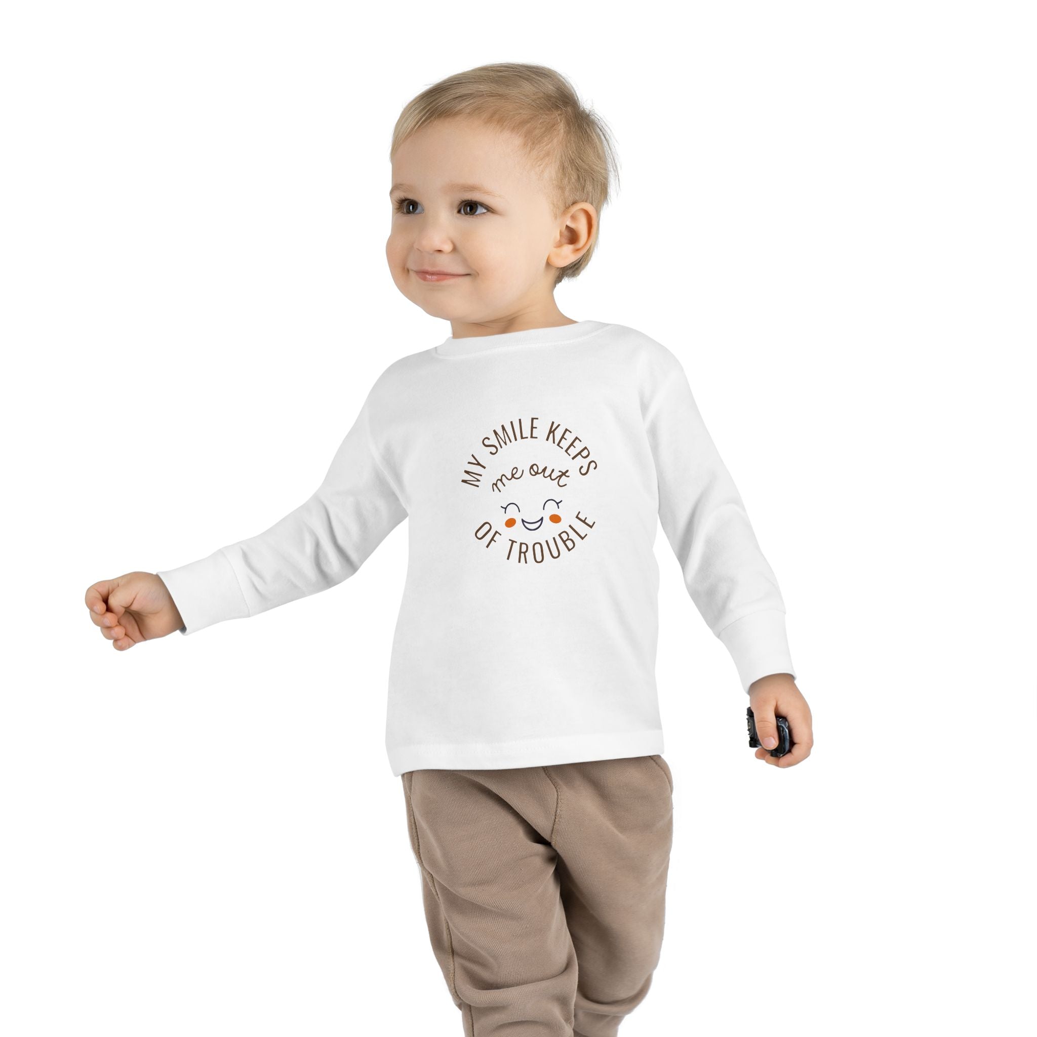 My smile keeps me out of trouble Toddler Long Sleeve Tee